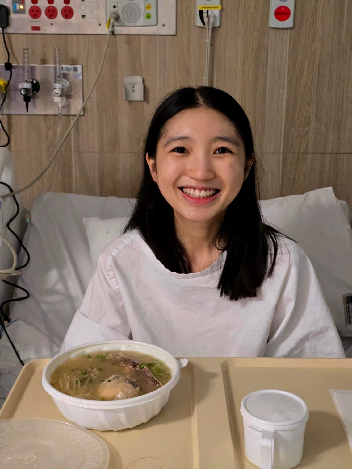 Small fibre neuropathy patient Tan Zi Ting in the hospital in April after her enteral tube revision surgery.