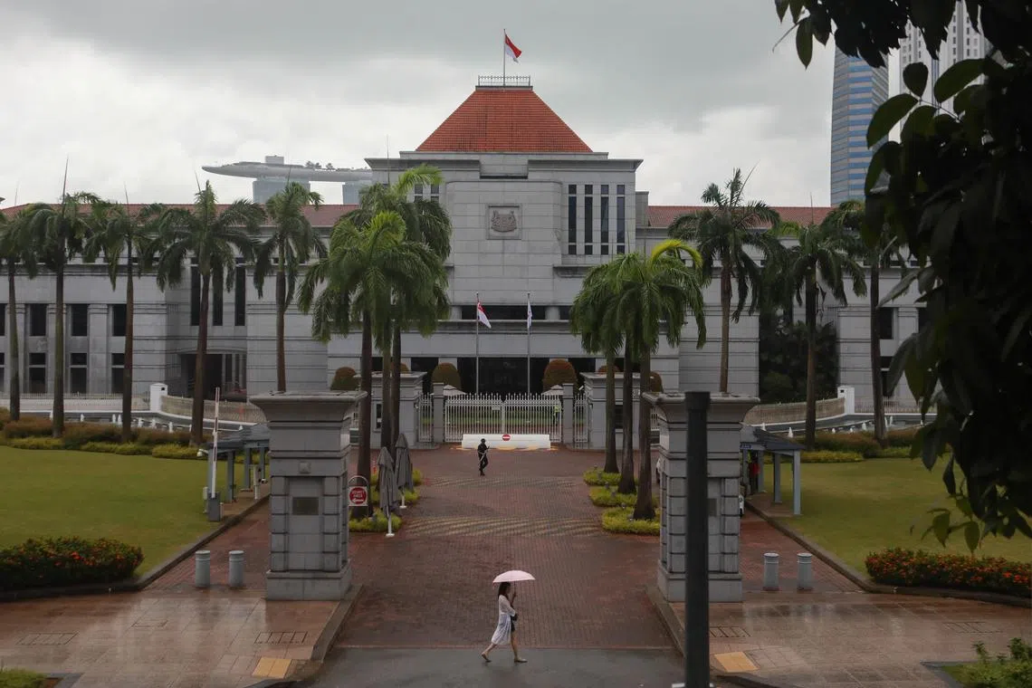 ST20230227_202309815970/pixgeneric/Ryan Chiong
Generic picture of woman with umbrella walking in front of Parliament House on a rainy day, shot from the High Street Centre on Feb 27, 2023.
Can be used for stories about budget, parliament, government, policy, economy, politics, recession, market, shrinking, law, gloomy, rain, public policy.