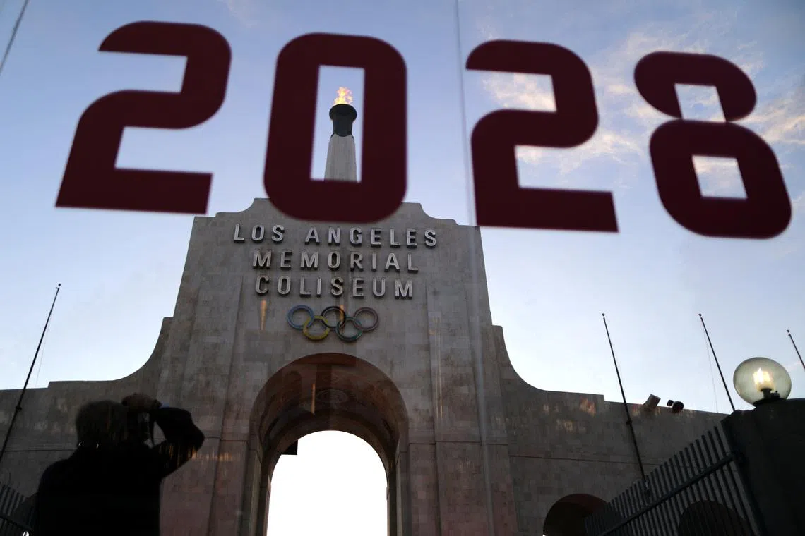 An LA2028 sign is seen at the Los Angeles Coliseum to celebrate Los Angeles being awarded the 2028 Olympic Games, in Los Angeles, California, U.S., September 13, 2017. REUTERS/Lucy Nicholson/File Photo