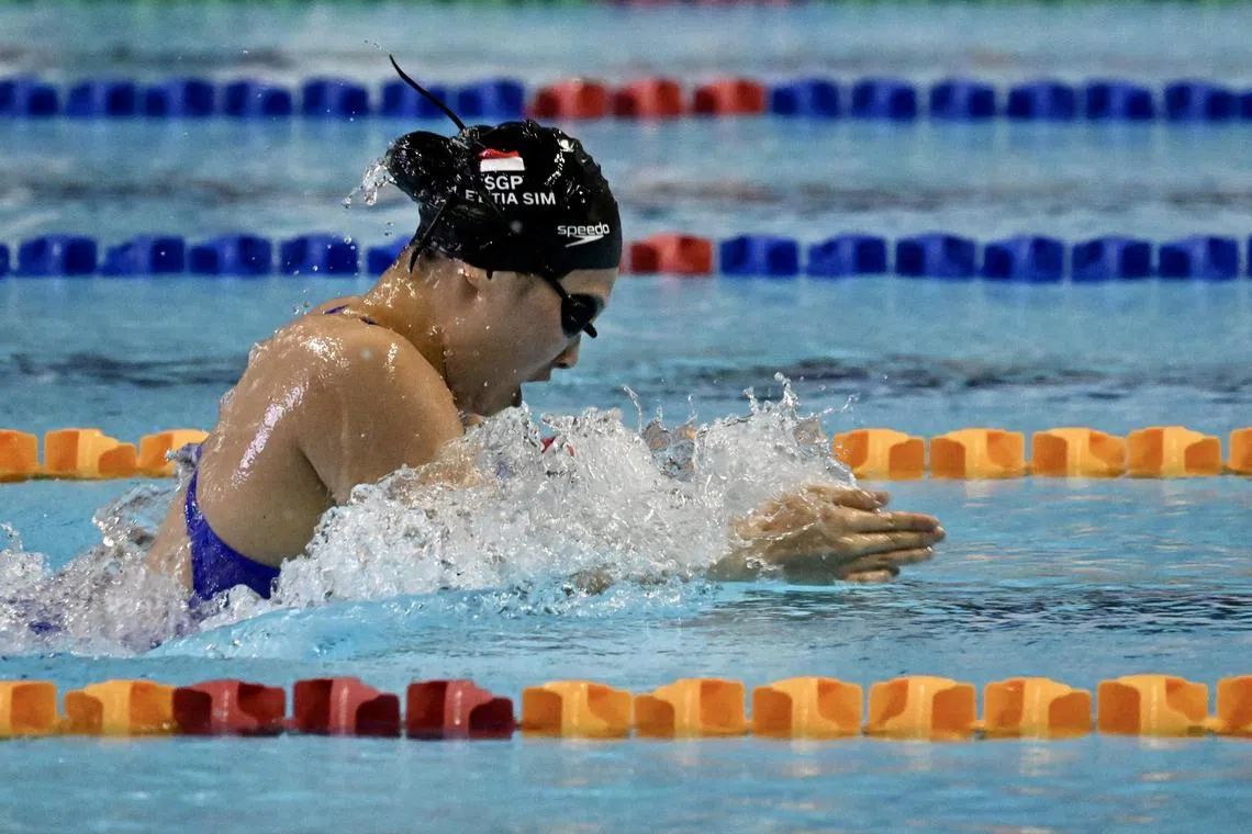 Singapore’s Leticia Sim winning the women’s 100m breaststroke and breaking the Games record at the Cambodia SEA Games.