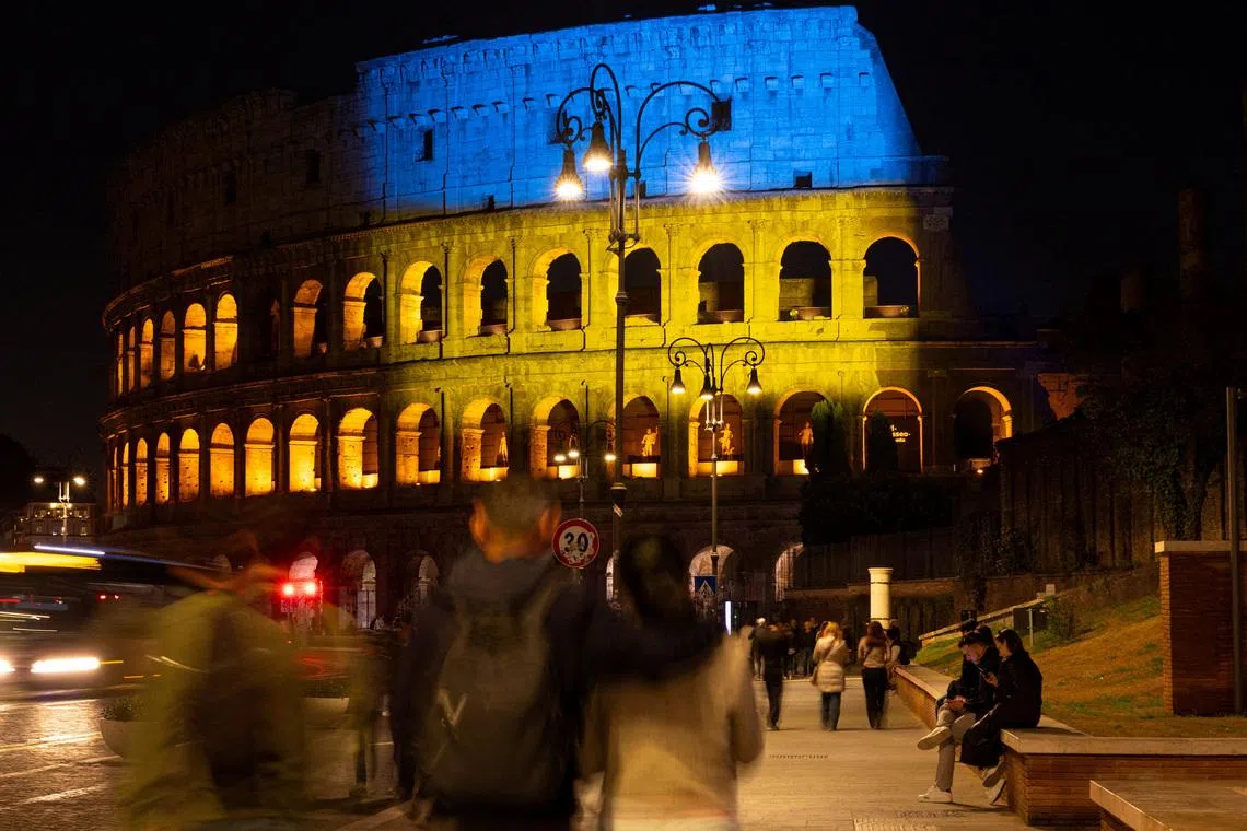 The Colosseum is illuminated in the colours of the Ukrainian flag, marking the fourth anniversary of Russia’s invasion of Ukraine, in Rome, Italy, on Feb 24, 2026. 