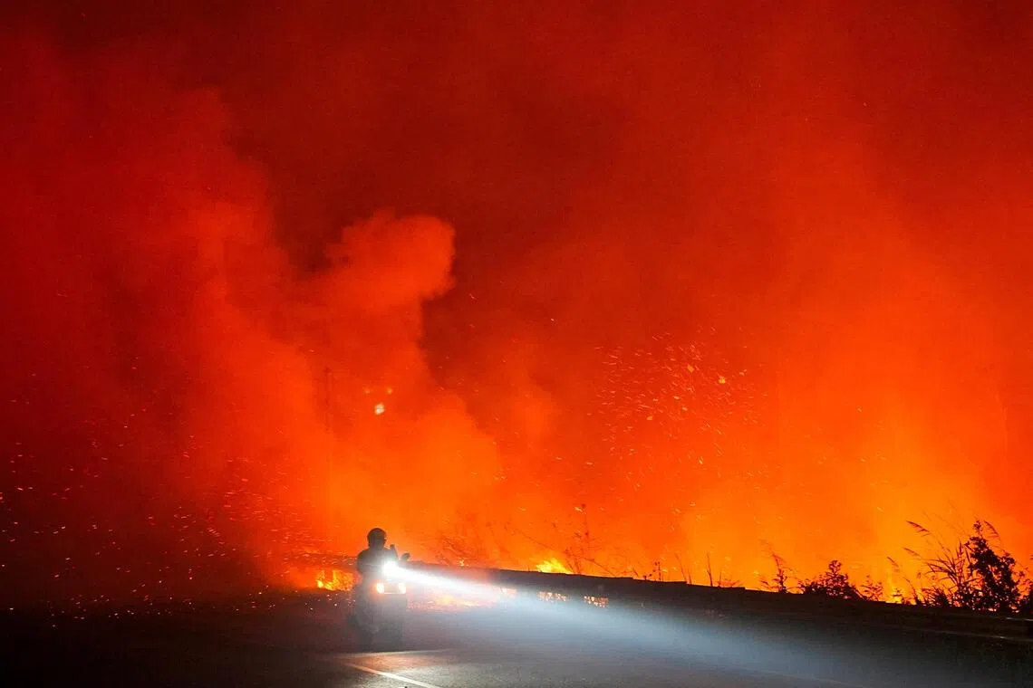 Indonesia’s wildfires may last until early November, minister says