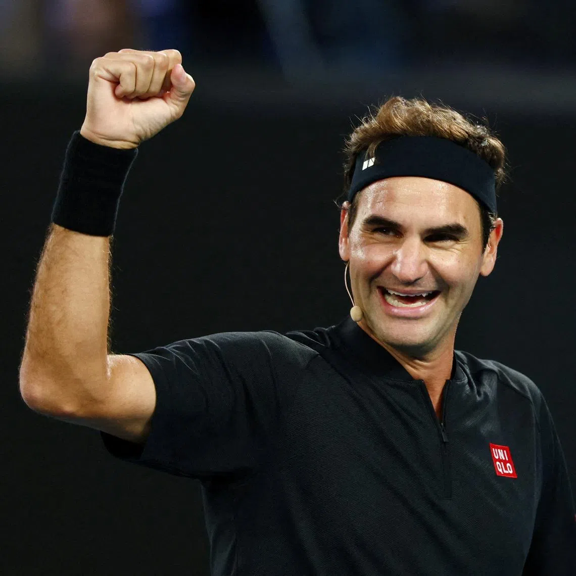 Tennis legend Roger Federer reacts during an exhibition match at the Australian Open in January 2026.