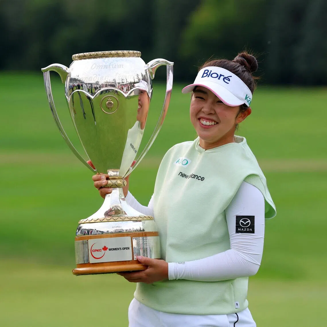 Japan’s Miyu Yamashita celebrates her win after the final round of the CPKC Women’s Open tournament at Royal Mayfair Golf Club on Aug 23.