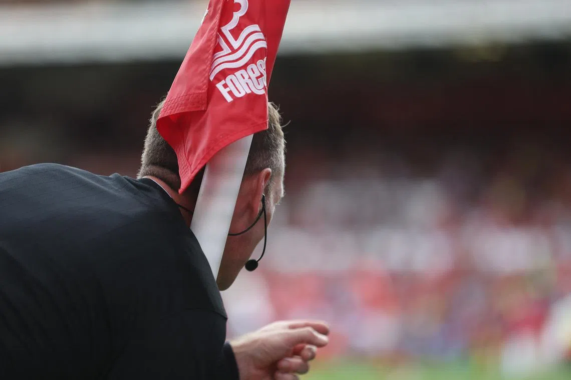 FILE PHOTO: Soccer Football - Premier League - Nottingham Forest v Tottenham Hotspur - The City Ground, Nottingham, Britain - August 28, 2022 General view of a corner flag being collected after the match Action Images via Reuters/Carl Recine/File Photo