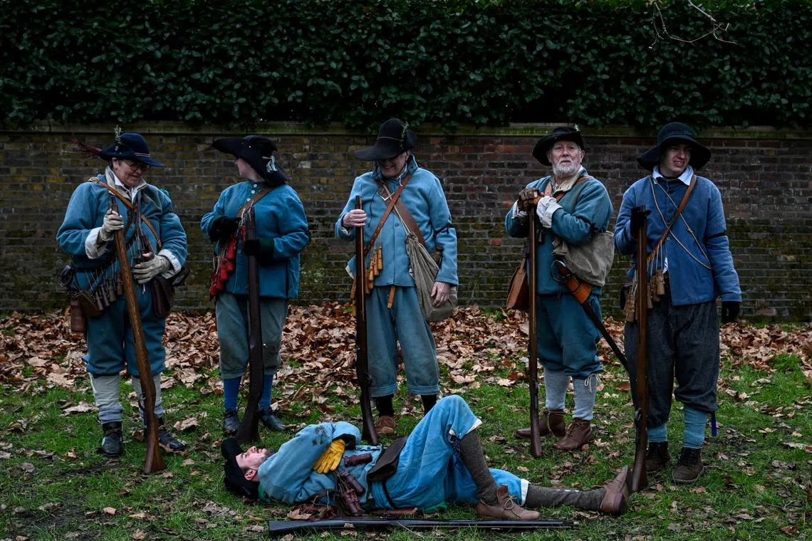 Historical reenactors from the English Civil War Society dressed as the King's Army, preparing for a march to commemorate the beheading of King Charles I in 1649, in London, Britain, on Jan 26, 2025.