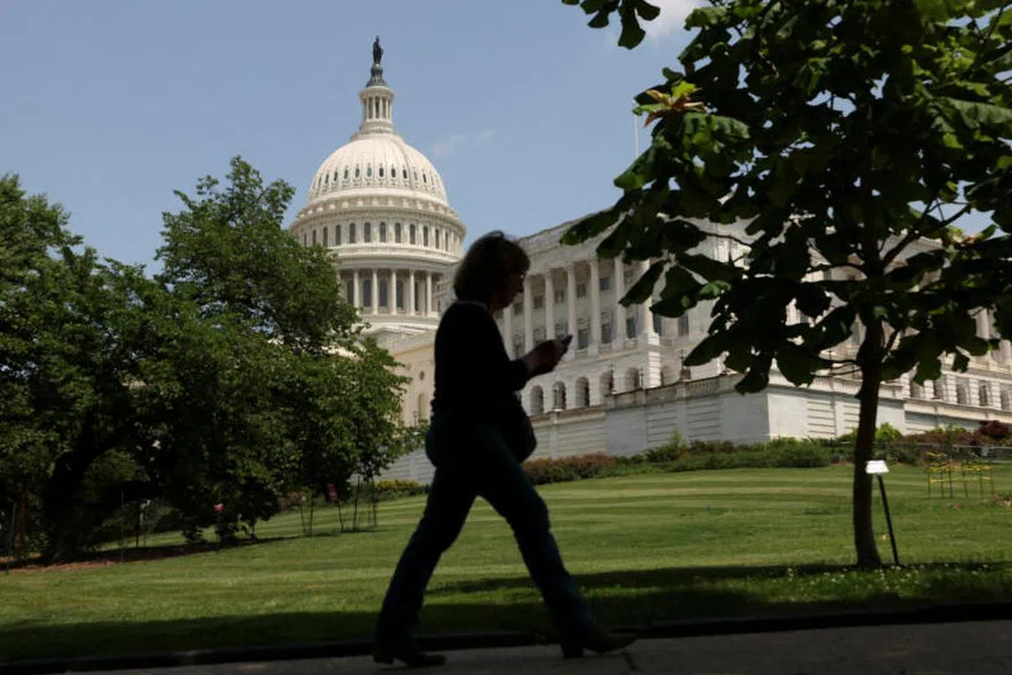 A person walks the grounds of US Capitol on May 16, in Washington, DC. 