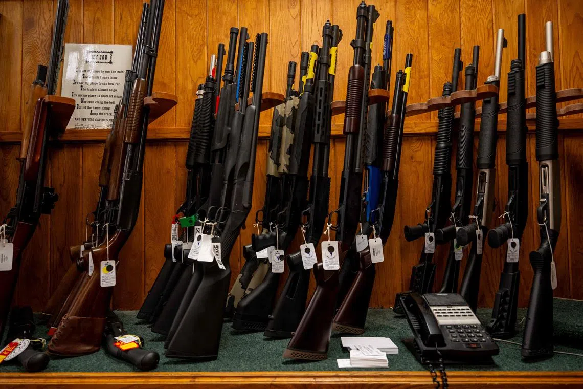 AUSTIN, TEXAS - AUGUST 25: Semi-automatic shotguns are displayed for sale on shelves at the McBride Guns Inc. store on August 25, 2023 in Austin, Texas. The Biden administration plans to revoke licenses from hundreds of firearms dealers, provoking disagreements among gun-store owners and law-enforcement veterans around the country.   Brandon Bell/Getty Images/AFP (Photo by Brandon Bell / GETTY IMAGES NORTH AMERICA / Getty Images via AFP)