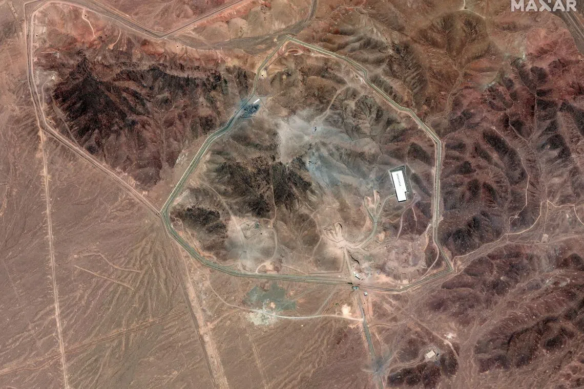 A satellite overview shows Iran's  Fordow Fuel Enrichment Facility, along with damage from June 23 airstrikes.