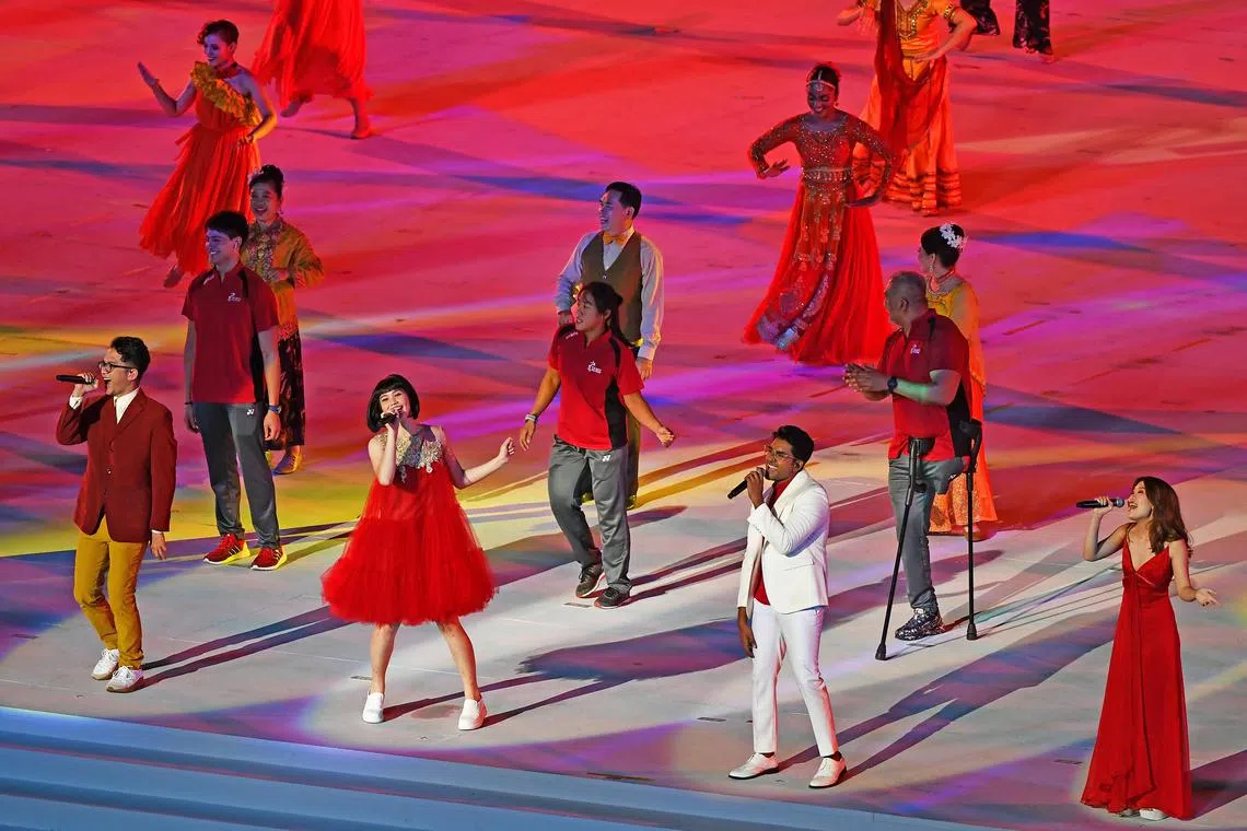 (From left) Sezairi Sezali, Shye-Anne Brown, Shabir Tabare Alam and Linying performing this year’s theme song, The Road Ahead, during the finale of the NDP show held at The Float @ Marina Bay on 21 August, 2021. The Road Ahead was one of three new songs introduced at the parade.