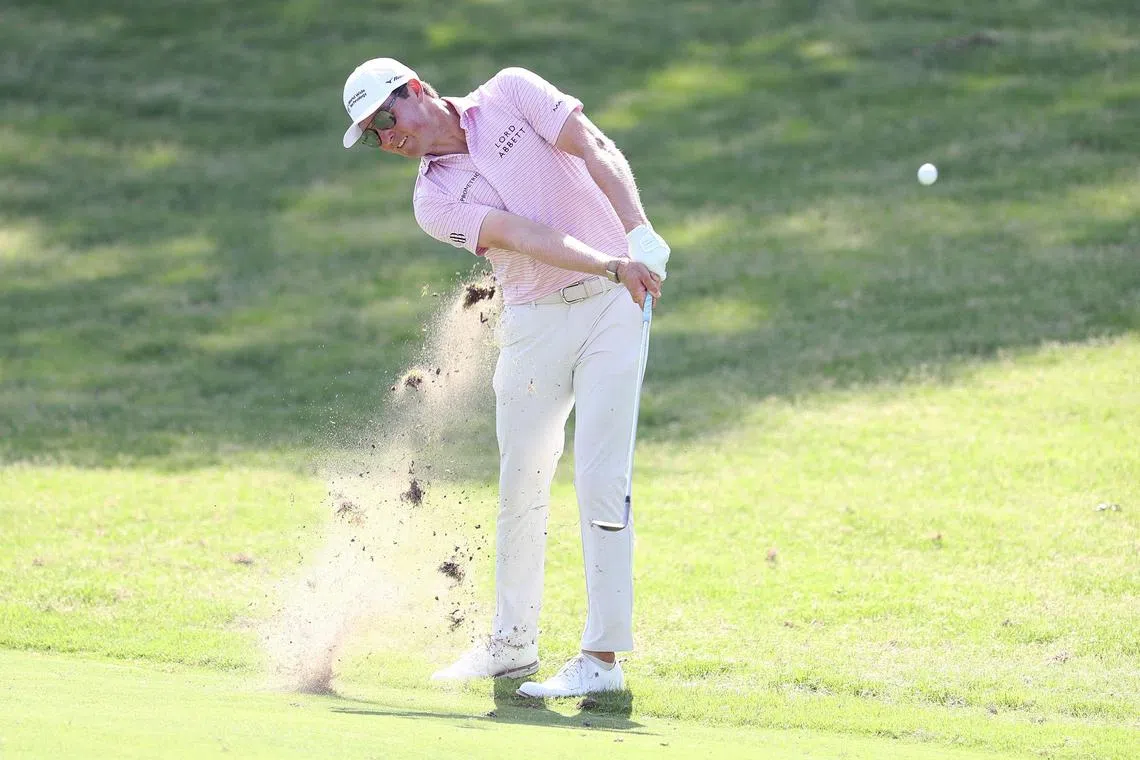 Ben Griffin of the United States plays a shot on the 18th hole during the third round of the Charles Schwab Challenge.