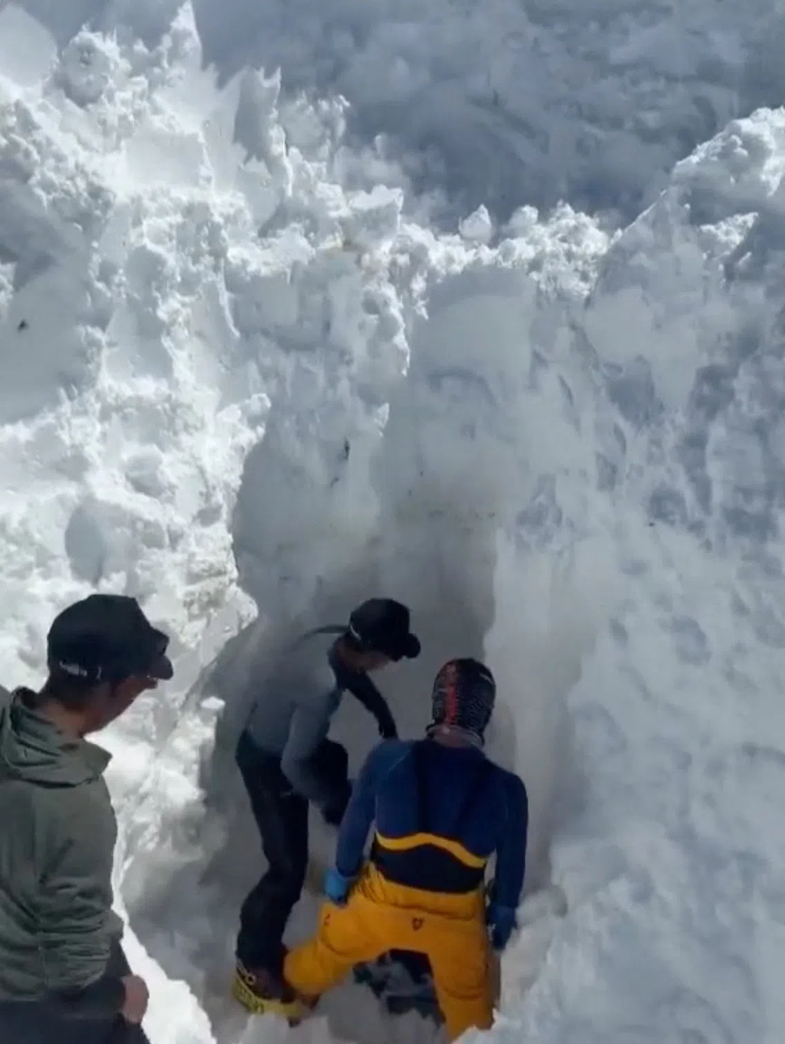 Rescue workers searching for survivors on Sept 28, after an avalanche buried the Himlung base camp in Nepal.