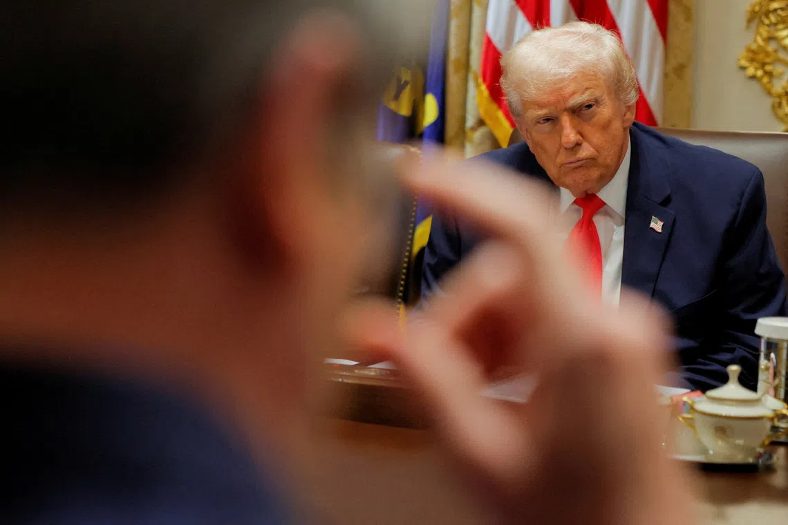 U.S. President Donald Trump attends a cabinet meeting at the White House in Washington, D.C., U.S., December 2, 2025. REUTERS/Brian Snyder