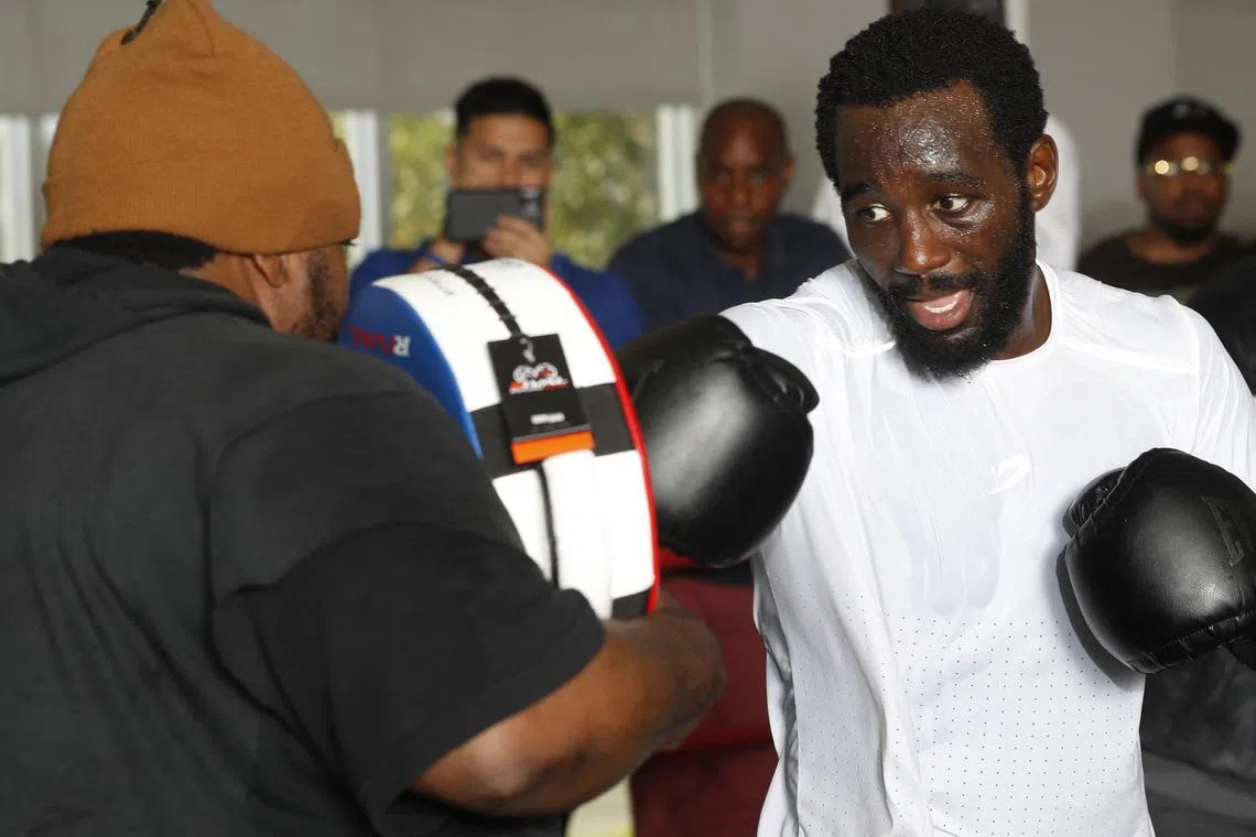 Terence Crawford (right) said he’s especially concerned about fighters who haven’t made it as far as he has in their careers. 