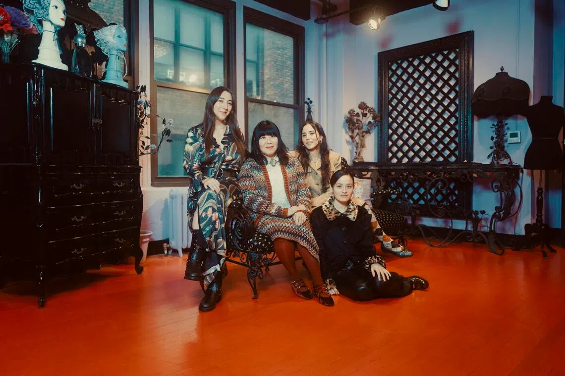 Anna Sui (centre) with her nieces (from left) Isabelle Sui, Jeannie Sui Wonders and Chase Sui Wonders at her atelier and showroom in New York, Dec 19, 2025. 