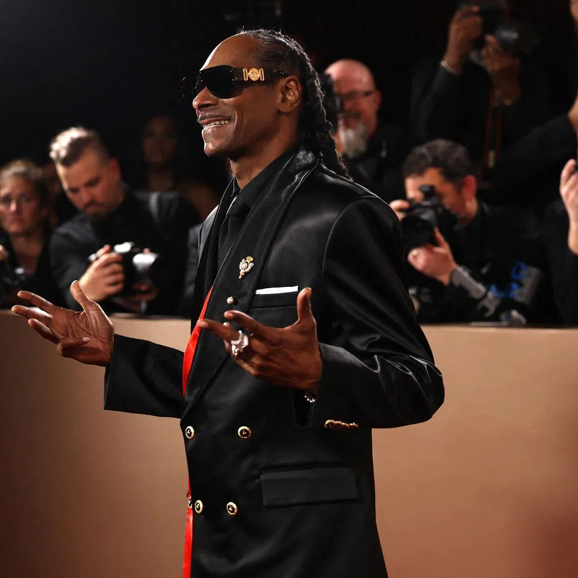 Snoop Dogg poses on the red carpet at the 83rd Annual Golden Globes in Beverly Hills, California, U.S., January 11, 2026. REUTERS/Daniel Cole