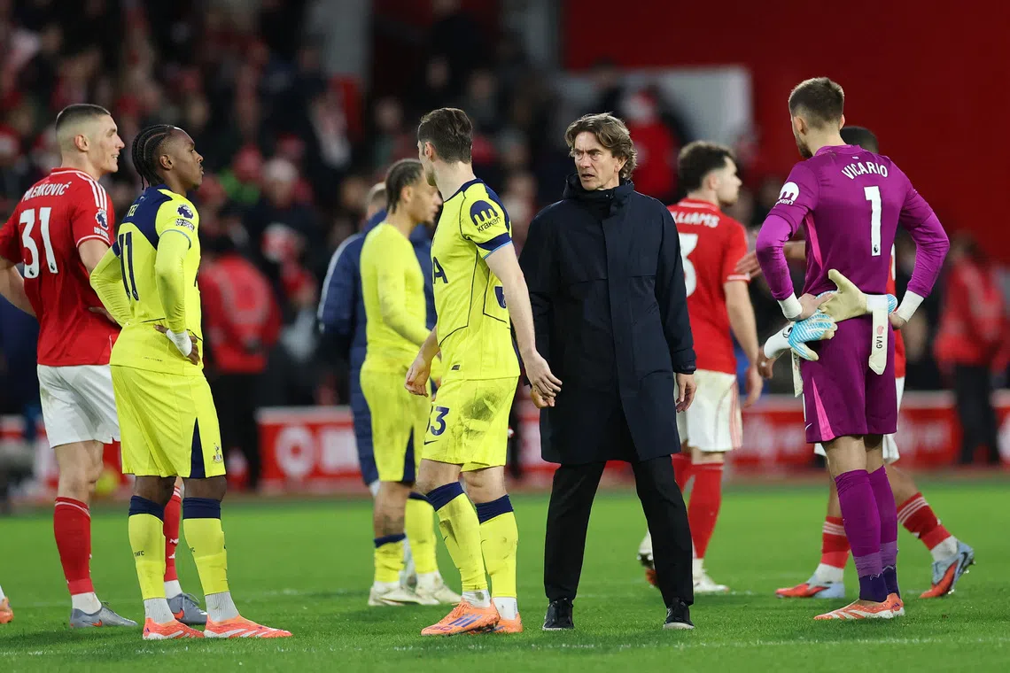 Soccer Football - Premier League - Nottingham Forest v Tottenham Hotspur - The City Ground, Nottingham, Britain - December 14, 2025 Tottenham Hotspur manager Thomas Frank, Tottenham Hotspur's Ben Davies, Tottenham Hotspur's Mathys Tel and Tottenham Hotspur's Guglielmo Vicario after the match Action Images via Reuters/Andrew Boyers
