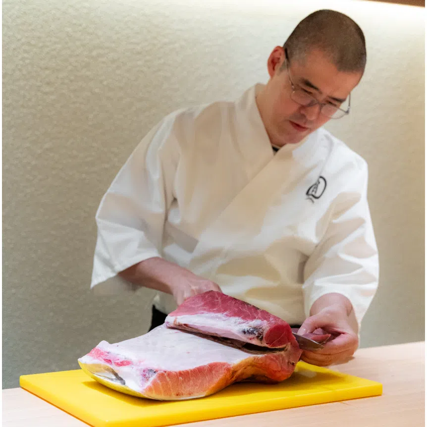 Sushidan’s hidden omakase is prepared by Japanese chef Yusuke Kawana (left). The hidden room seats six and reservations must be made in advance.