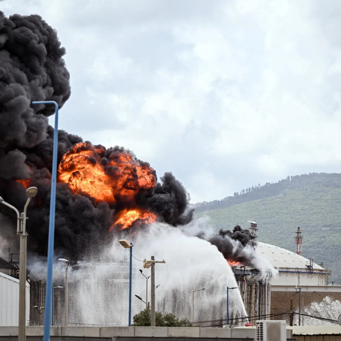 A blaze after Israel's Fire and Rescue Service said that an industrial building and a fuel tanker at Israel's Oil Refineries were hit by debris from an intercepted Iranian missile, amid the U.S.-Israel conflict with Iran, in Haifa, Israel March 30, 2026. REUTERS/Rami Shlush