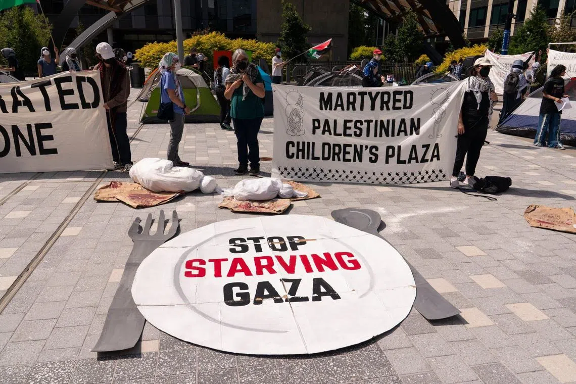 Microsoft employees hold a rally for Gaza at the company’s Redmond, Washington, headquarters on Aug 19, 2025.