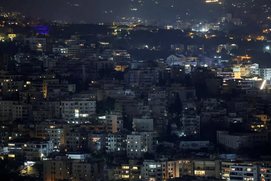 FILE PHOTO: A view of Beirut's southern suburbs, amid ongoing hostilities between Hezbollah and Israeli forces, as seen from Sin El Fil, Lebanon, October 6, 2024. REUTERS/Amr Abdallah Dalsh/File Photo