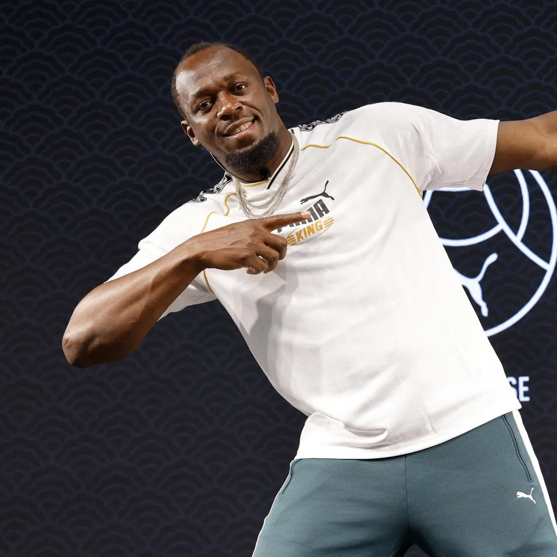Athletics - Usain Bolt and Armand Duplantis during a Puma event in Tokyo ahead of the World Athletics Championships - Tokyo, Japan - September 11, 2025 Usain Bolt poses ahead of the World Athletics Championships REUTERS/Manami Yamada