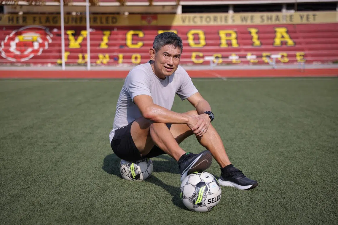 Victoria Junior College's football and cross country coach Tan Yew Hwee.

ST PHOTO: ONG WEE JIN