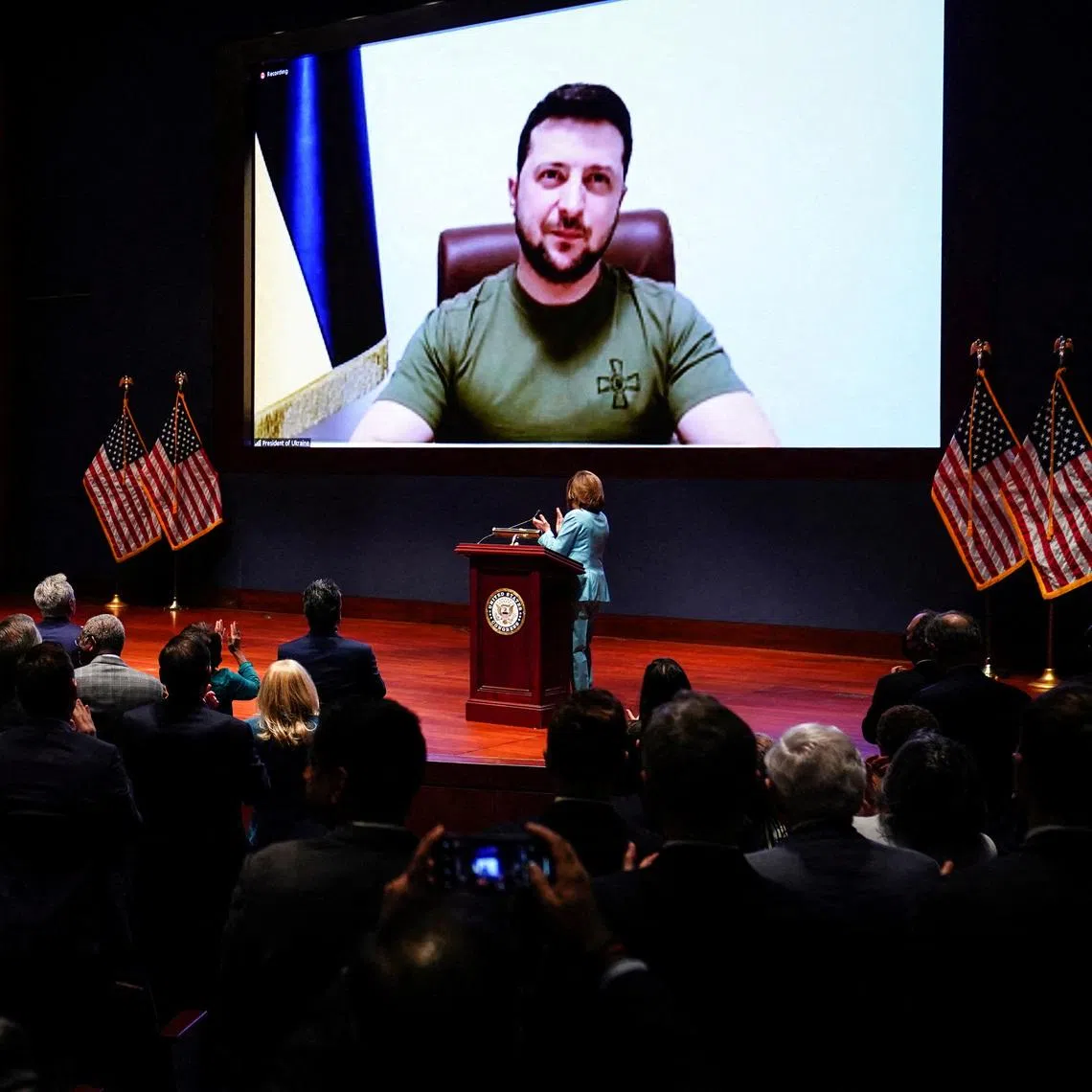 FILE PHOTO: Ukraine’s President Volodymyr Zelenskiy delivers a video address to senators and members of the House of Representatives gathered in the Capitol Visitor Center Congressional Auditorium at the U.S. Capitol in Washington, U.S., March 16, 2022. REUTERS/Sarah Silbiger/Pool/File Photo