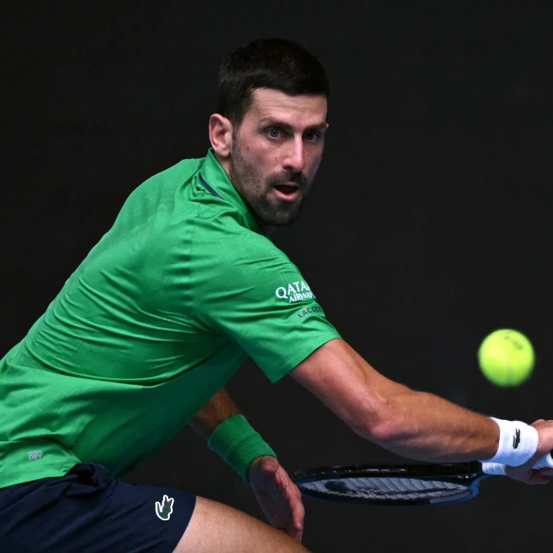 Tennis - Australian Open - Melbourne Park, Melbourne, Australia - January 28, 2026 Serbia's Novak Djokovic in action during his quarter final match against Italy's Lorenzo Musetti REUTERS/Jaimi Joy
