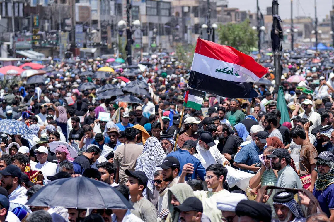 Protesters rallying in Baghdad on June 20 against Israel's strikes on Iran.