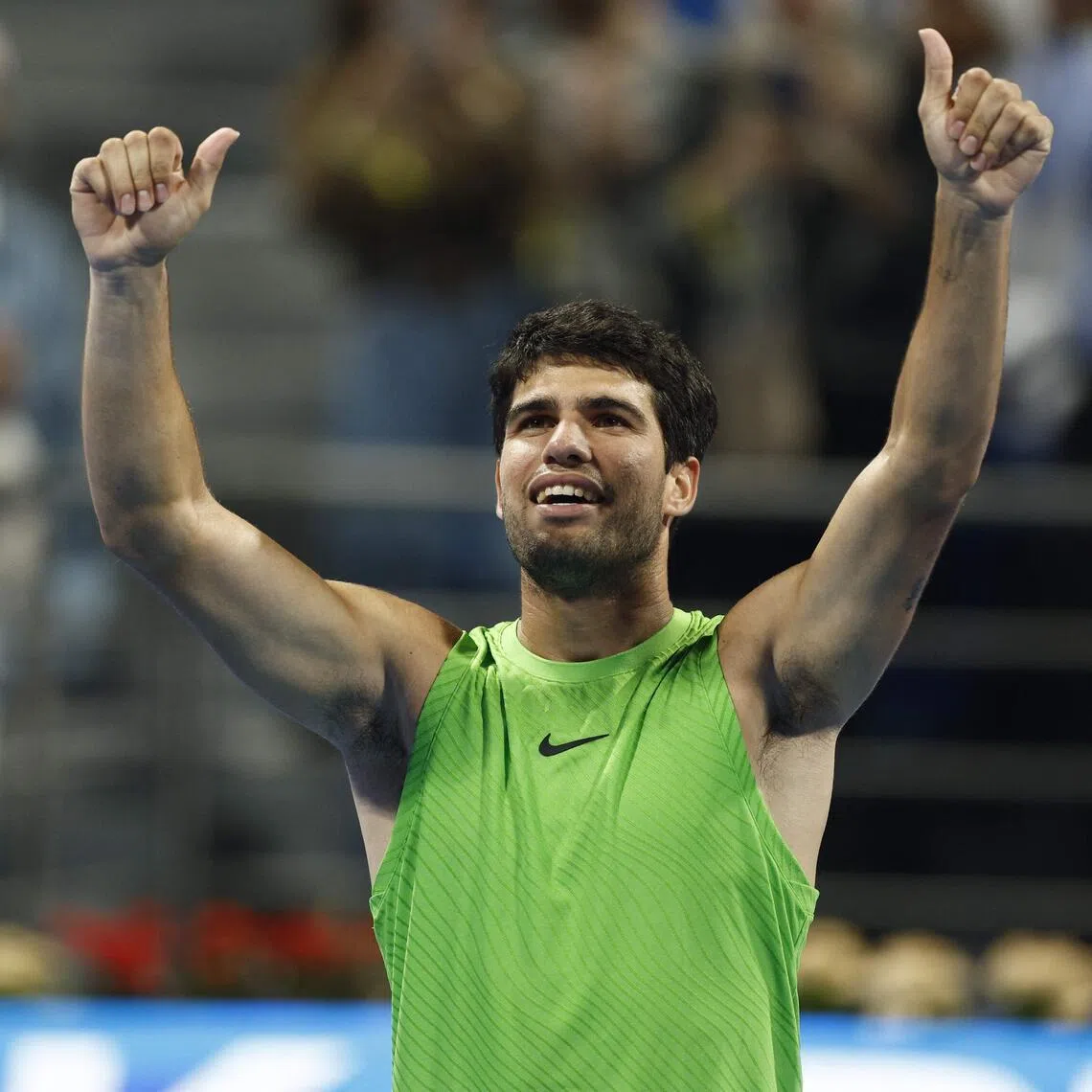 Spain's Carlos Alcaraz celebrates after beating Russia's Karen Khachanov on Feb 19.
