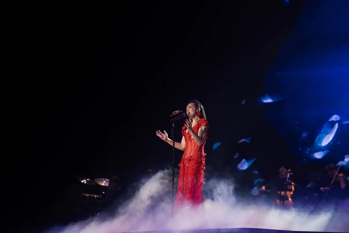 The song May Love Stay Strong (2023) was accompanied by large projections of fluttering butterflies.
