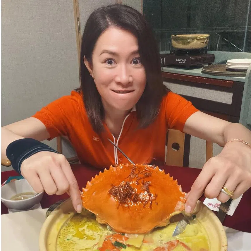 Charmaine Sheh shared photos of herself having chilli crab and durian dessert in Singapore.