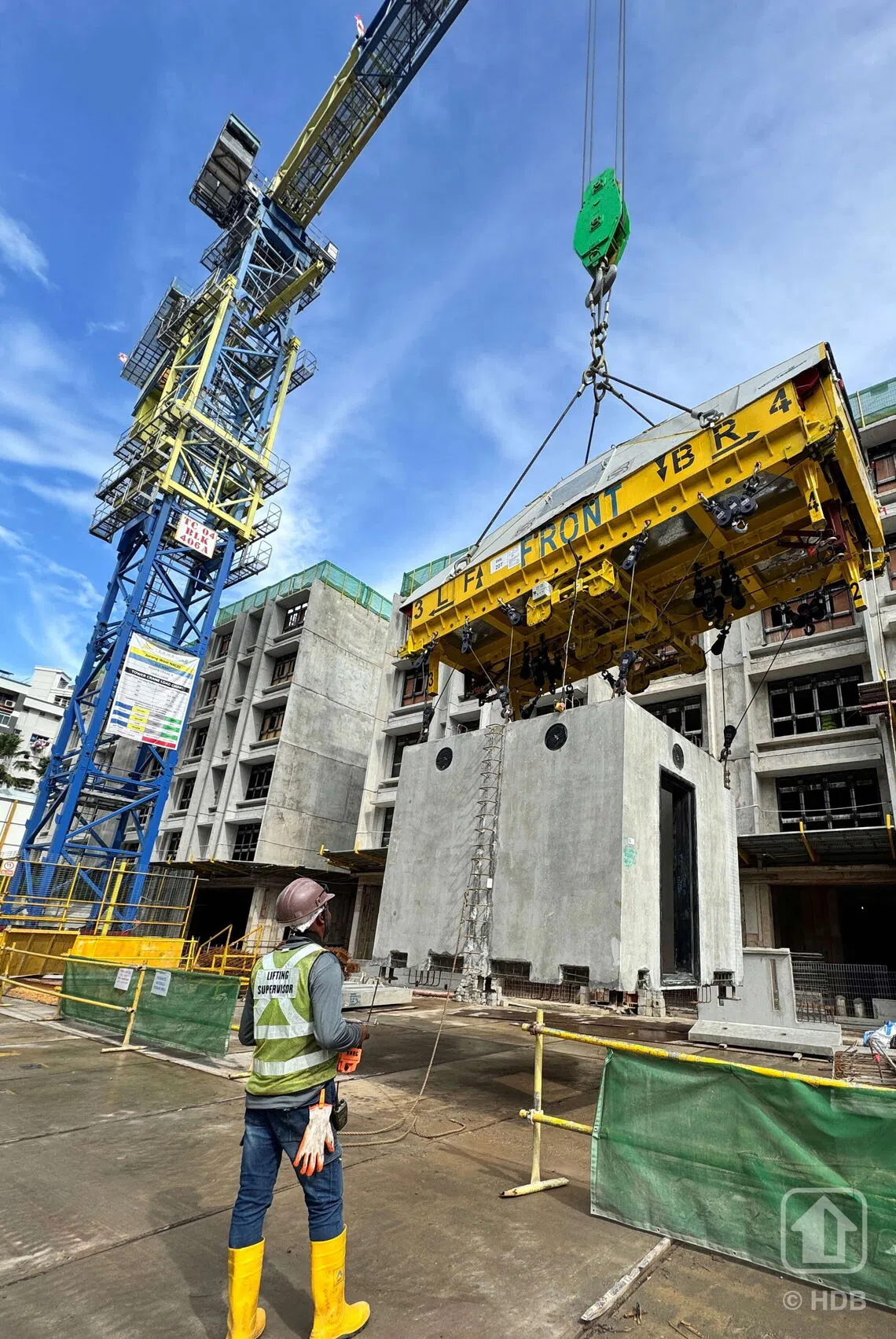 The intelligent lifting frame on operation at a BTO project in Jurong West.