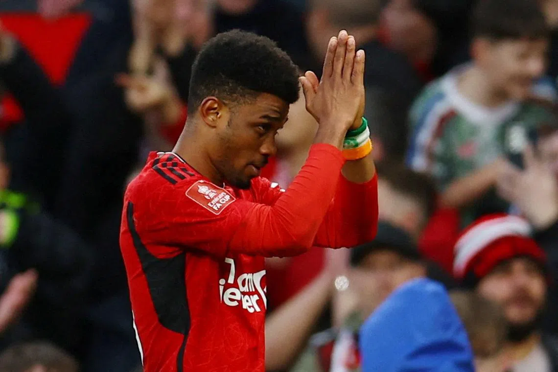 FILE PHOTO: Soccer Football - FA Cup - Quarter Final - Manchester United v Liverpool - Old Trafford, Manchester, Britain - March 17, 2024 Manchester United's Amad Diallo celebrates scoring their fourth goal REUTERS/Molly Darlington/File Photo