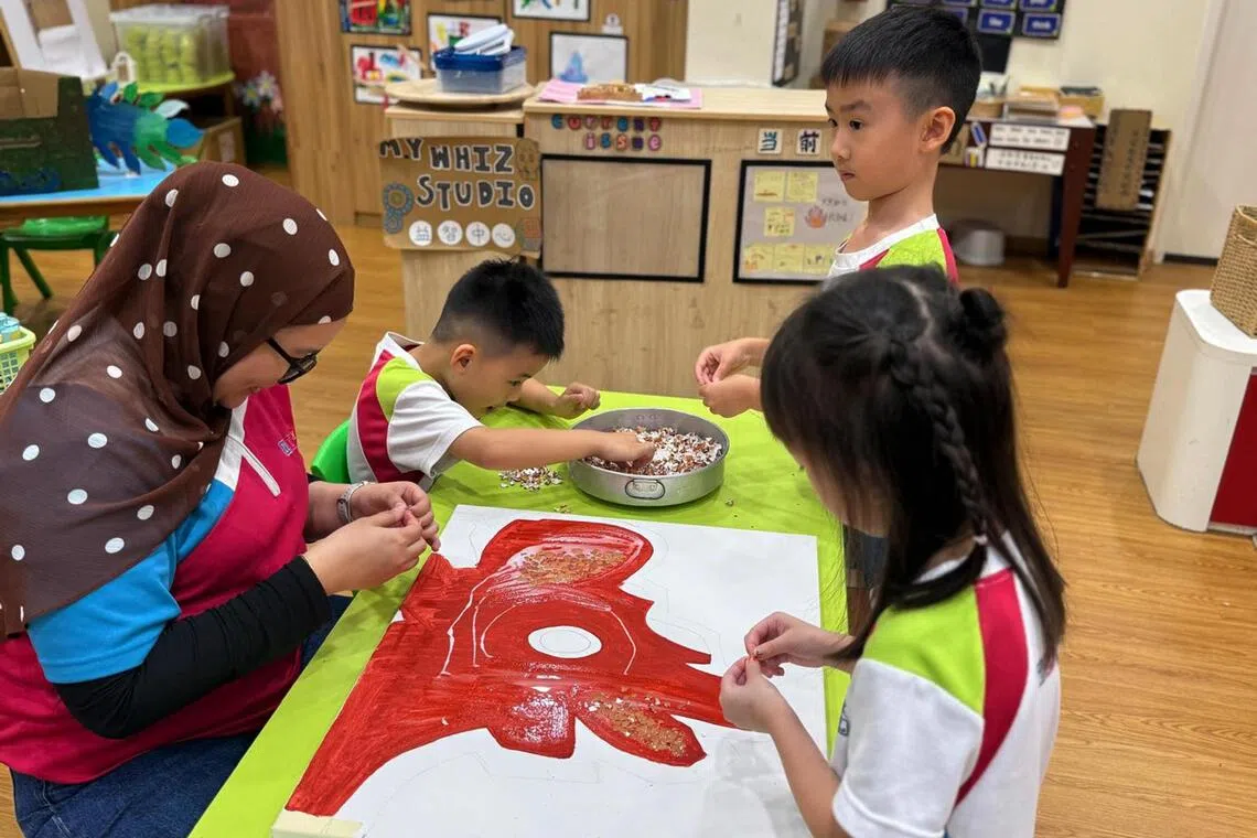 Pre-schoolers work alongside their teacher to bring their ideas to life.