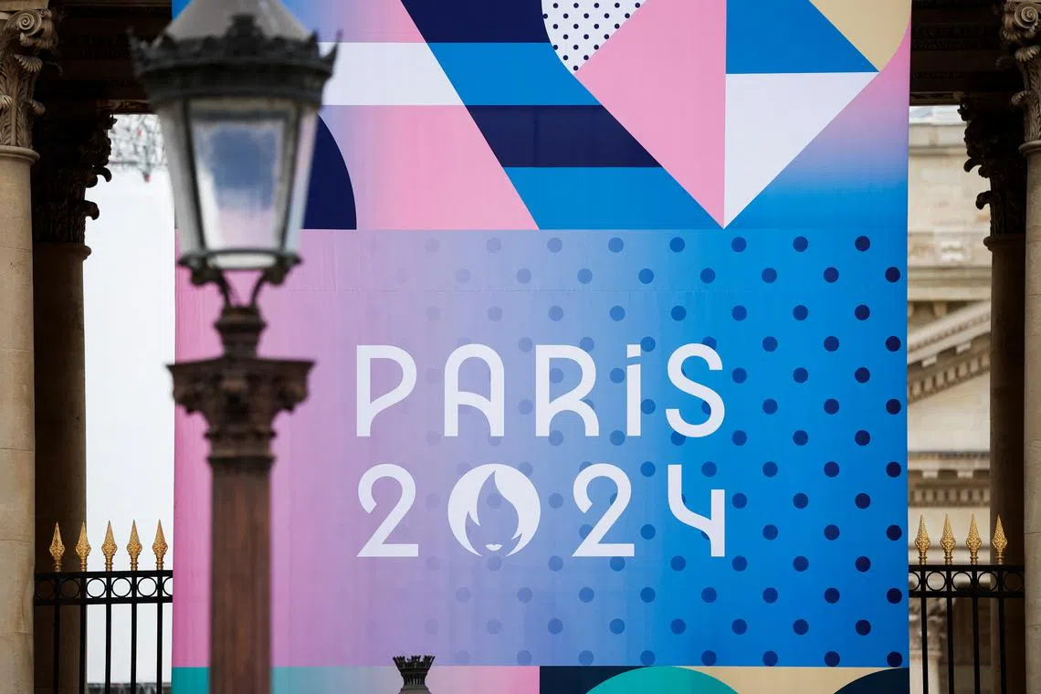 The logo of the Paris 2024 Olympic and Paralympic Games is pictured in front of the National Assembly in Paris, France, May 2, 2024. REUTERS/Benoit Tessier/File Photo