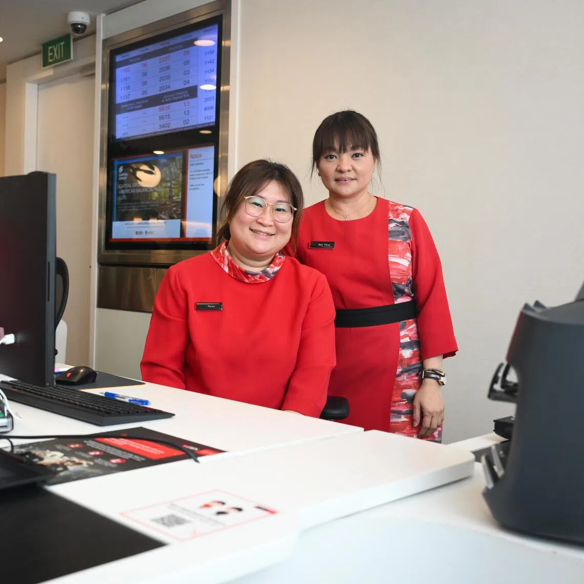Ms Karen Teo (left), a bank officer from DBS South Bridge branch, and her supervisor, Ms Low Bee Peng, spent over an hour convincing the woman she had been scammed.