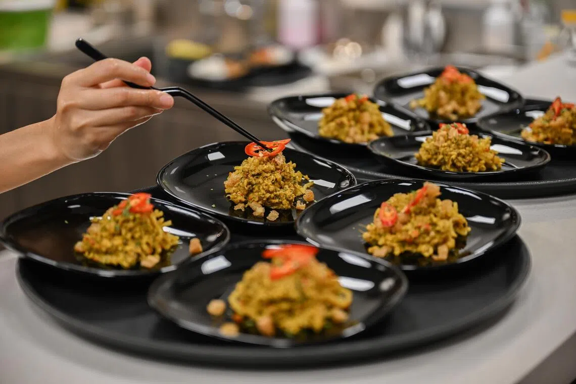 Q Protein is touting its products, like the minced chicken pictured here as part of a dry laksa dish, as a healthier alternative to real meat. 