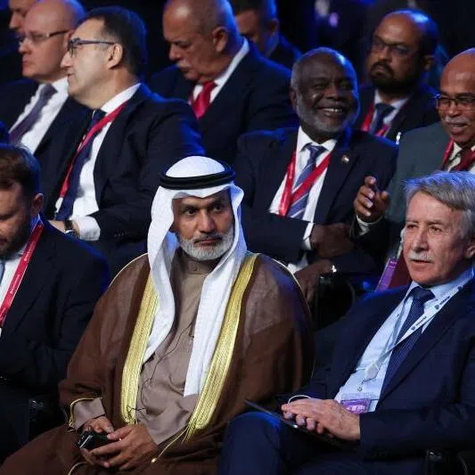 Opec Secretary-General Haitham al-Ghais (centre), attending a plenary session of the Russian Energy Week forum in Moscow on Oct 16.