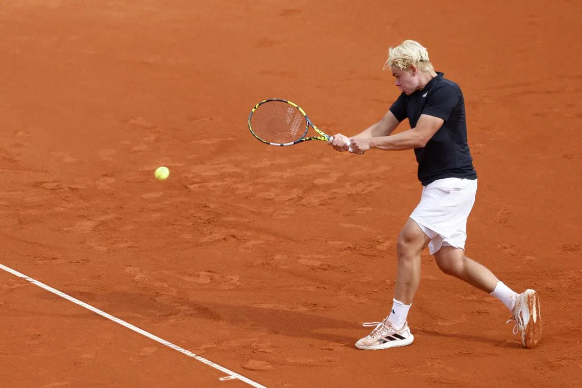 FILE PHOTO: Tennis - ATP 500 - Munich Open - MTTC Iphitos, Munich, Germany - April 15, 2025 Germany's Diego Dedura-Palomero in action during his round of 32 match against Canada's Denis Shapovalov REUTERS/Michaela Stache/File Photo