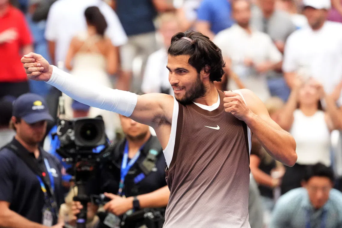Carlos Alcaraz added a white undershirt to his attire during his third-round match.