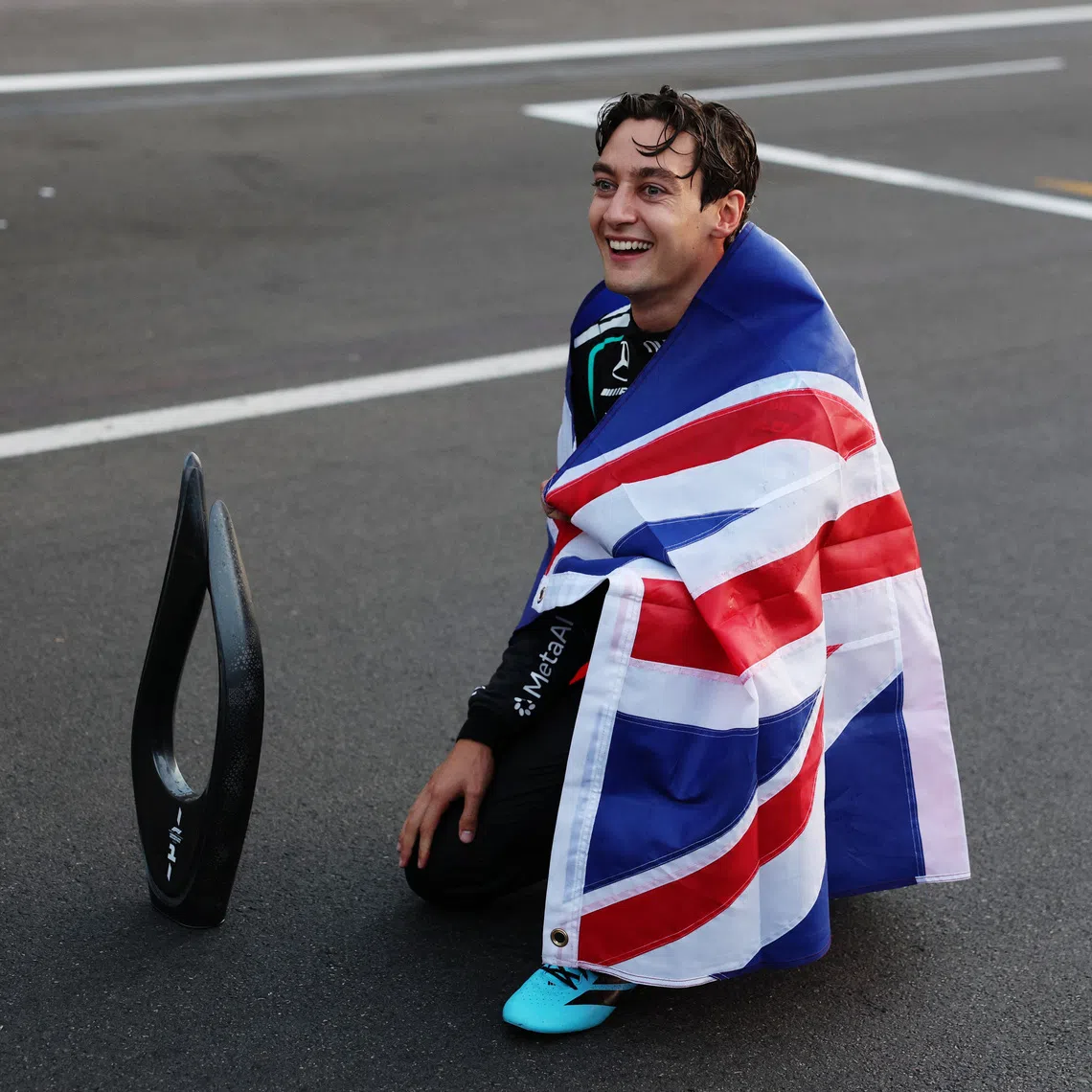 Formula One F1 - Azerbaijan Grand Prix - Baku City Circuit, Baku, Azerbaijan - September 26, 2026 Mercedes' George Russell celebrates after winning the race REUTERS/Ramil Sitdikov