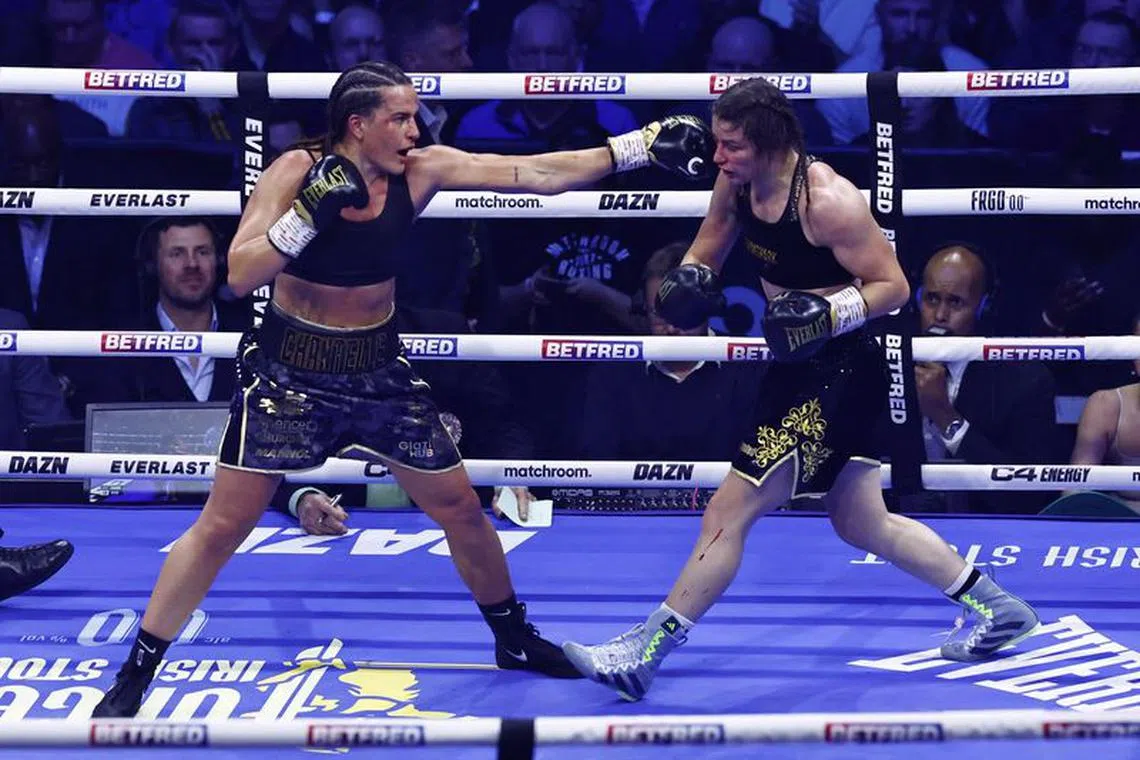Boxing - Chantelle Cameron v Katie Taylor - IBF, IBO, WBA, WBC & WBO World Super Lightweight Titles - 3Arena, Dublin, Ireland - November 25, 2023 Katie Taylor in action against Chantelle Cameron REUTERS/Clodagh Kilcoyne