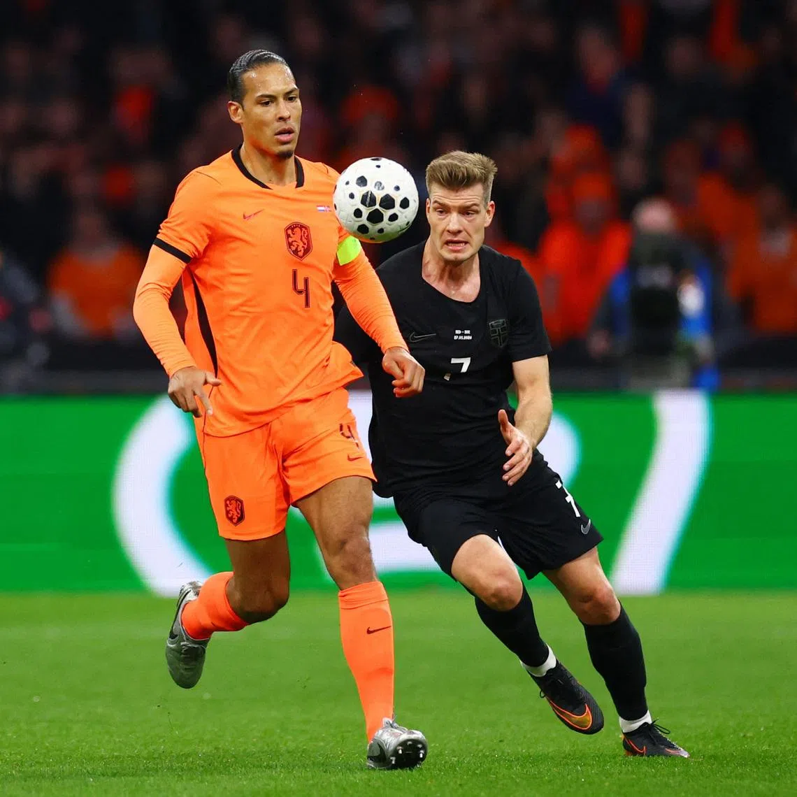 Soccer Football - International Friendly - Netherlands v Norway - Johan Cruijff Arena, Amsterdam, Netherlands - March 27, 2026 Netherlands' Virgil van Dijk in action with Norway's Alexander Sorloth REUTERS/Piroschka Van De Wouw