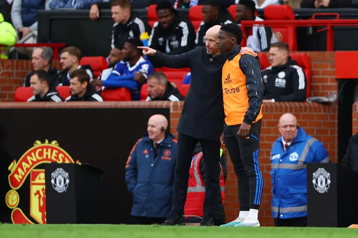 Manchester United manager Erik ten Hag giving instructions to substitute Kobbie Mainoo during their 3-0 Premier League win over Leicester City.