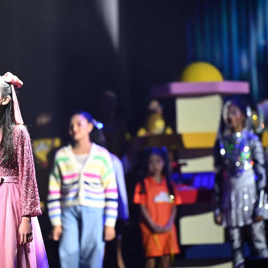 The festival includes the return of young talents such as visually impaired singer Nur Anisah Daaniys Sufian (far left), seen here performing at ChildAid 2024.