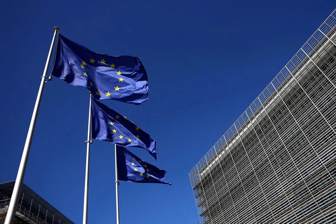 FILE PHOTO: European Union flags flutter outside the European Commission headquarters in Brussels, Belgium April 29, 2026. REUTERS/Yves Herman/File Photo