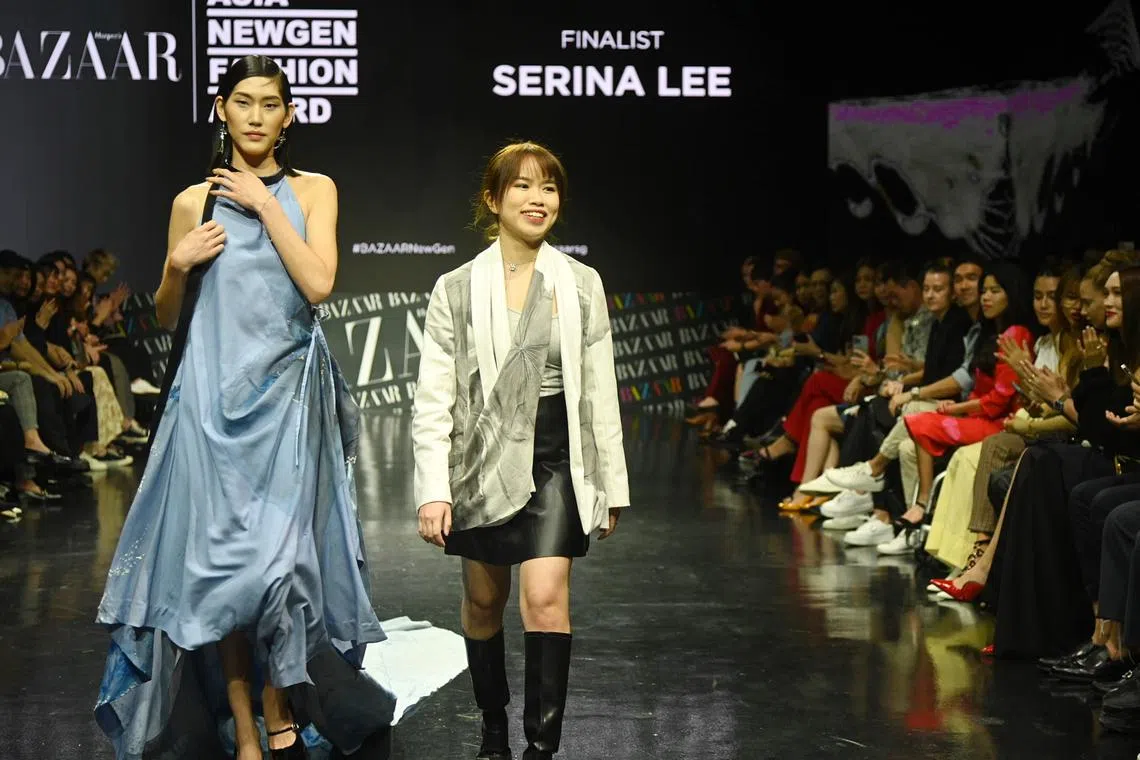 Ms Serina Lee with her fashion design collection won the Harper’s BAZAAR Asia NewGen Fashion Award on 10 Nov 2022. She received her awards from Kenneth Goh , EIC of Harper's BAZAAR Singapore,

After a two-year hiatus due to the Covid-19 pandemic, Harper's BAZAAR Singapore, in partnership with Chanel Singapore and supported by Chivas Regal, will be hosting the finale runway show live for this year’s edition of the Asia NewGen Fashion Award 2022.

The final runway show will see the 6 finalists showcase their outstanding collections, with the winner of Harper’s BAZAAR Asia NewGen Fashion Award crowned that very night.