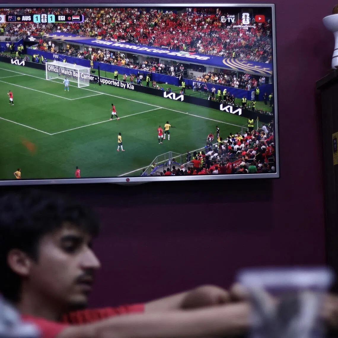 A TV screen showing a World Cup 2026 match on CazeTV, a Brazilian YouTube channel, in Sao Paulo, on July 3.